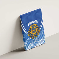 Blue canvas wall art mounted on wall with Estonia title and gold coat of arms crest