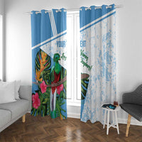 Blue and white window curtain panels with rod clips, bird-and-flower artwork and text.