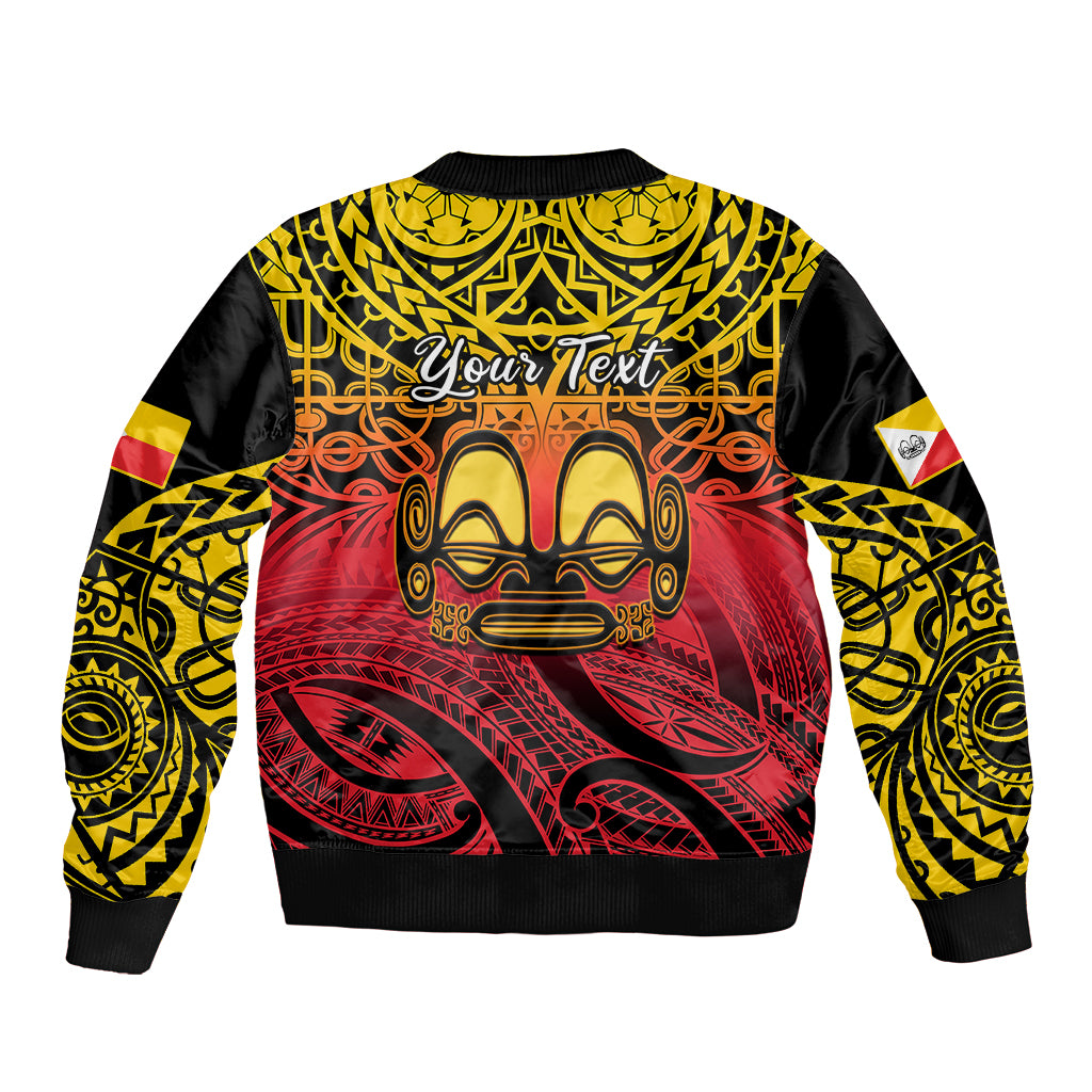 Black bomber jacket with Polynesian tiki face graphic and yellow red patterned sleeves