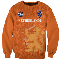 Orange crewneck sweatshirt with Netherlands front graphic, soccer ball and crest
