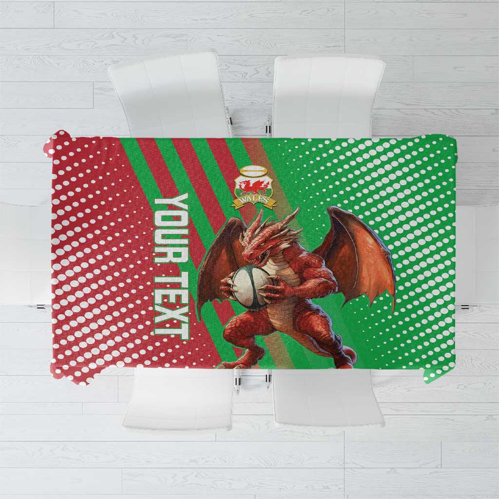 Green and red rugby-style tablecloth with polka-dot pattern and Wales dragon crest.
