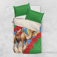 Eritrea bedding set folded: blue-and-green cover with camel scene and red gerbera flowers