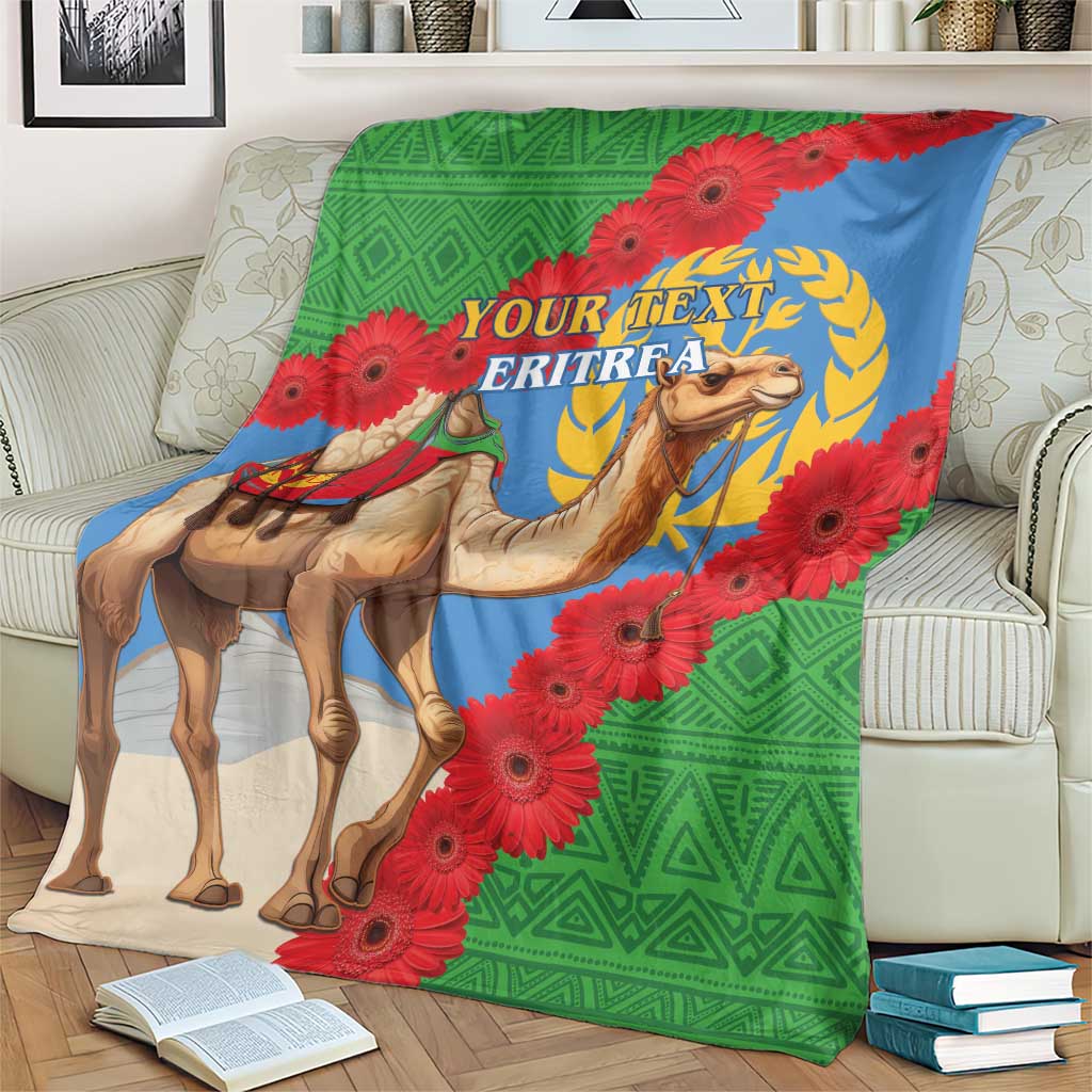 Personalised Eritrea camel blanket draped on sofa, green geometric and red flower details