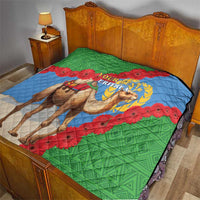 Eritrea flag quilt blanket on a bed with camel scene, green blue red, “Your Text”