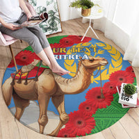 Round flag-style area rug featuring camel, red gerbera flowers, blue center and green edge
