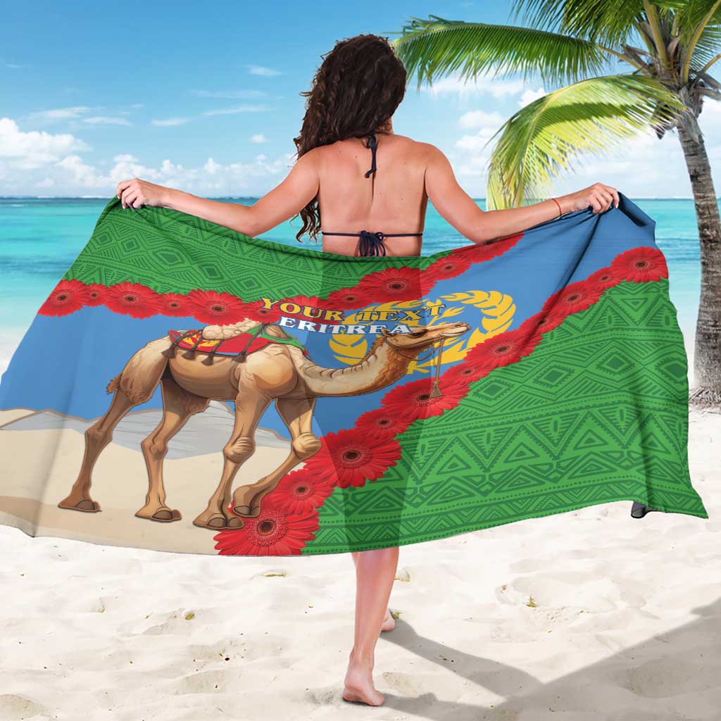 Green beach sarong draped with Eritrea flag camel and red flower wreath