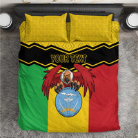 Mali bedding set: yellow patterned pillows and multicolor duvet with coat of arms, 'YOUR TEXT'