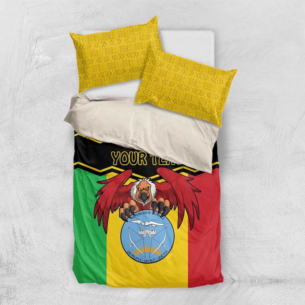 Mali bedding set with two yellow patterned pillows and multicolor duvet featuring coat of arms