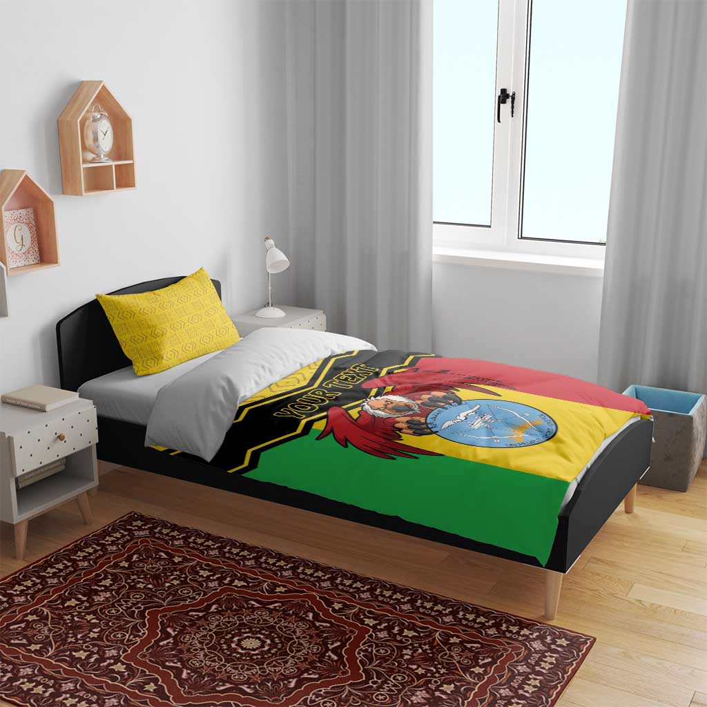 Mali bedding set on bed: multicolor duvet with black chevrons and coat of arms image