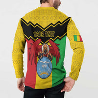 Yellow long-sleeve button polo sweatshirt with “YOUR TEXT” and crest graphic, back view