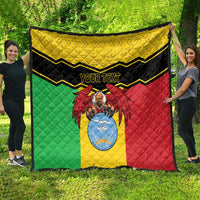 Personalised Mali quilt featuring red vulture artwork over yellow shield, green and red panels