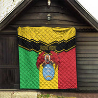 Personalised Mali quilt hanging indoors with black border, zigzag stripes, and vulture crest
