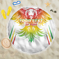 Round white beach blanket with “YOUR TEXT” and Les Aigles lion crest, fringed edge