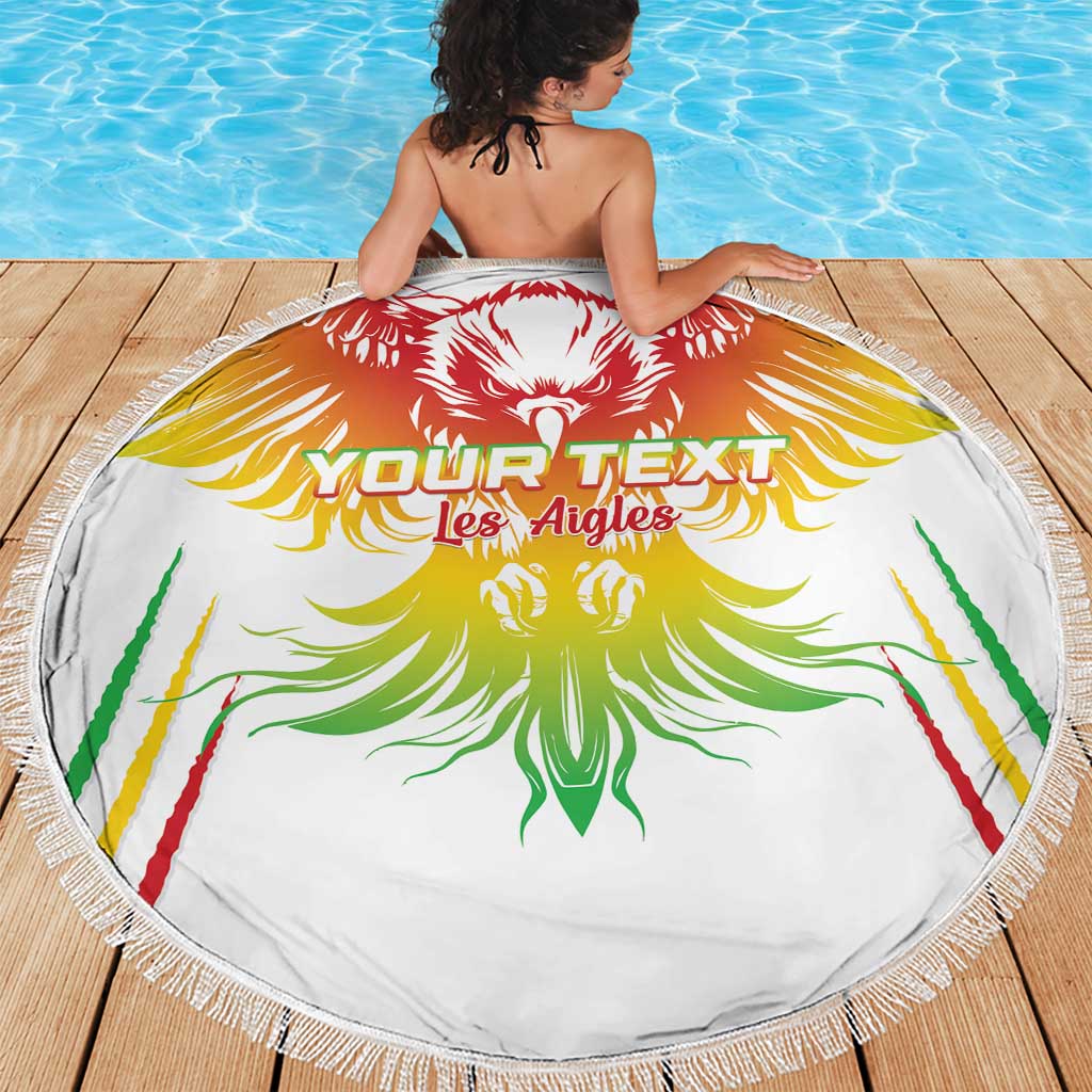 Round white beach blanket with colorful Mali football lion emblem and fringe edge