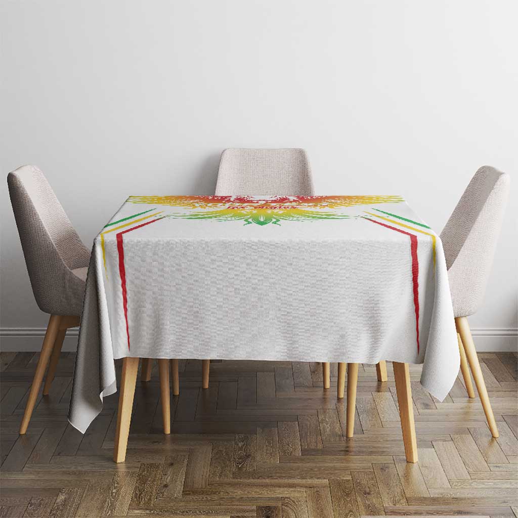 White football tablecloth with colorful center crest, draped on dining table
