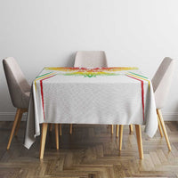 White football tablecloth with colorful center crest, draped on dining table
