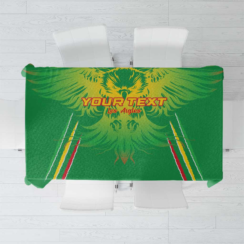 Green football tablecloth mockup with YOUR TEXT and gold lion logo.