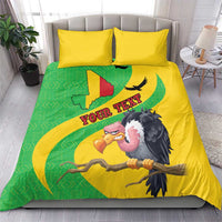 Bedding set with yellow duvet, green Mali map panel, vulture graphic, and two matching pillows