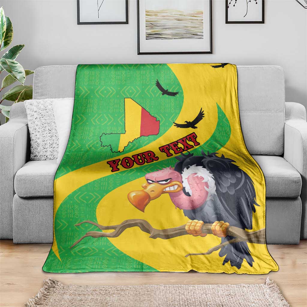 Green and yellow Mali-themed blanket featuring cartoon vulture face and “YOUR TEX”