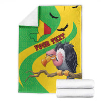 Folded green and yellow Mali flag map blanket with cartoon vulture and “YOUR TEX”