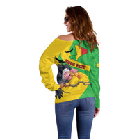 Women’s off-shoulder sweater back view angled, Mali flag map and vulture print, yellow/green