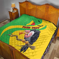 Quilted bed throw quilt in green and yellow with Texas map, vulture graphic, and text