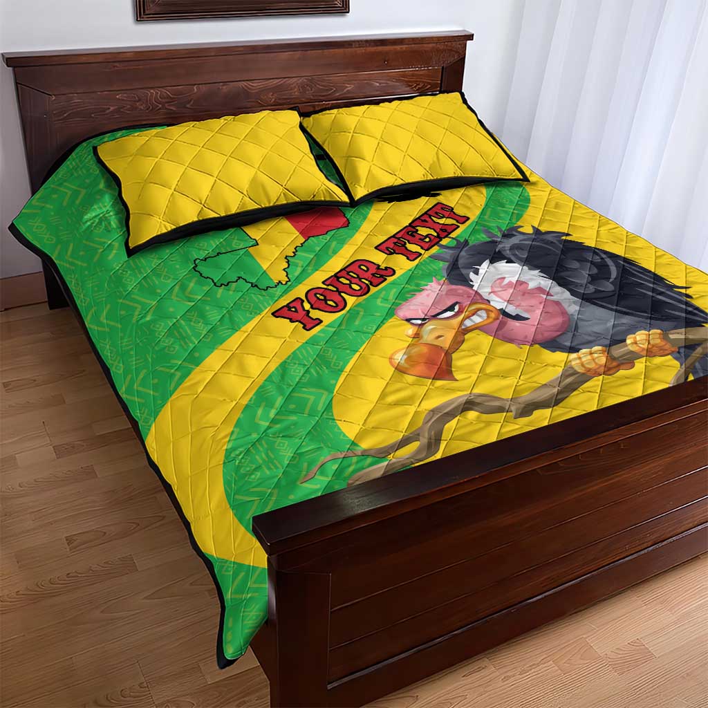 Yellow quilt bed set with green map and bird face graphic, two quilted pillows on wooden bed.