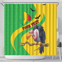 Shower curtain with green and yellow map pattern and smiling cartoon vulture