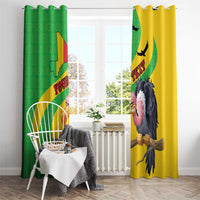 Curtain set on rod with green and yellow Mali map and vulture print on each panel