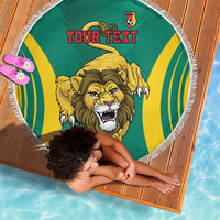 Green round beach blanket with yellow striped edge, lion face, crest, and “YOUR TEXT”.