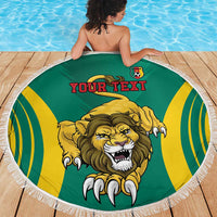Round green beach blanket with lion and “YOUR TEXT” across a yellow-striped design.