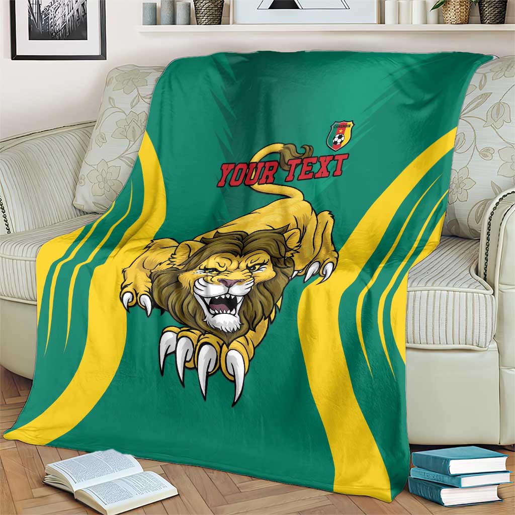 Green football blanket with lion emblem, yellow stripes, and Your Text shown on sofa
