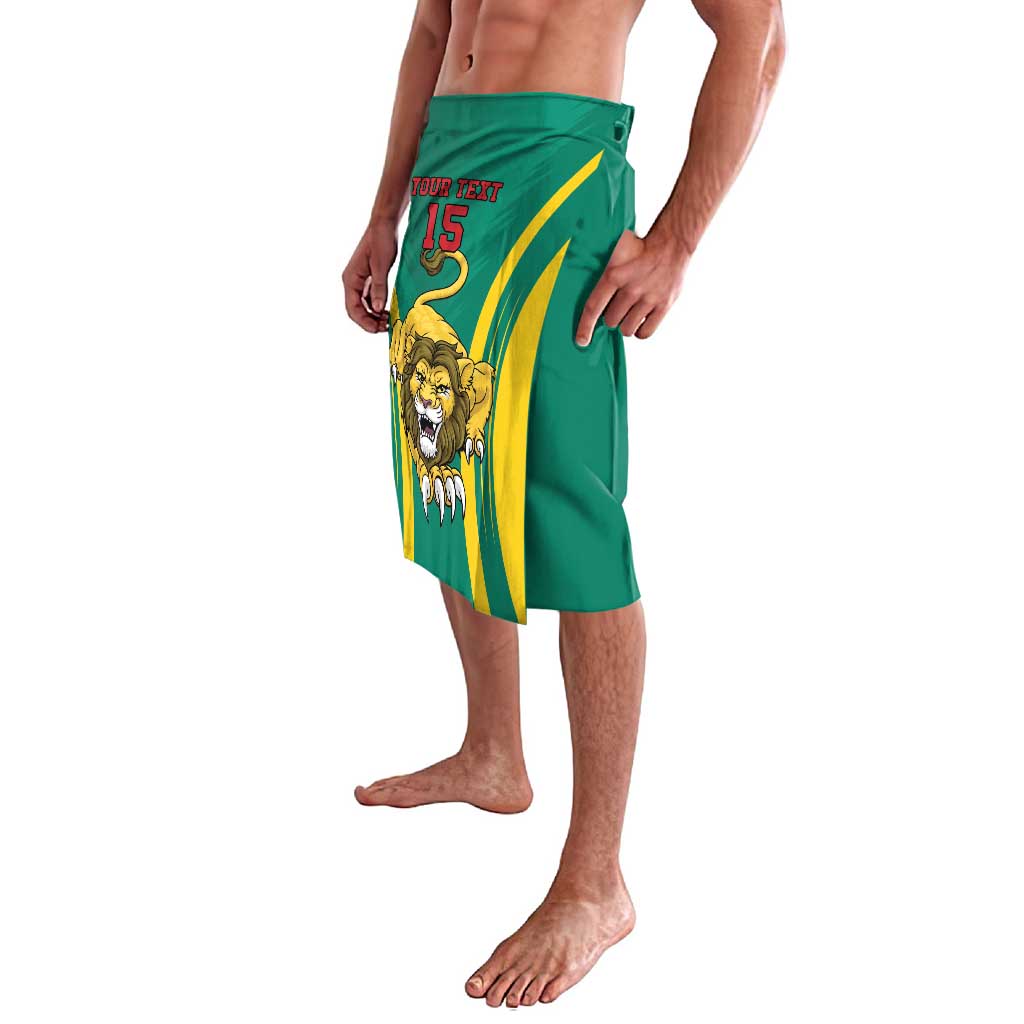 Green lavalava-style football skirt, side view, lion emblem and yellow stripe panel