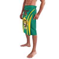 Green lavalava-style football skirt, side view, lion emblem and yellow stripe panel