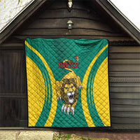 Green quilt with yellow wave stripes and lion graphic, featuring red 'YOUR TEXT'