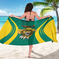 Green and yellow sarong worn like a dress, featuring lion emblem and red "YOUR TEXT"
