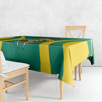 Green football tablecloth with lion graphic strip and yellow side stripes