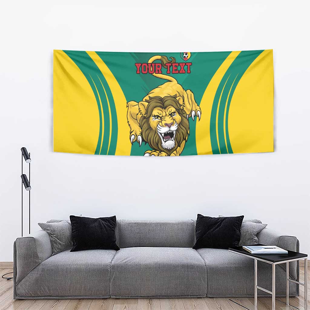 Cameroon football tapestry with lion head artwork, yellow wave stripes, and red "YOUR TEXT"