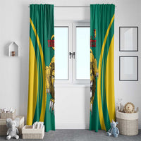 Set of custom green and yellow football window curtains with lion graphic and text