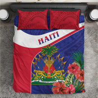 Haiti bedding set with red and blue design, white stripe, and two red patterned pillowcases