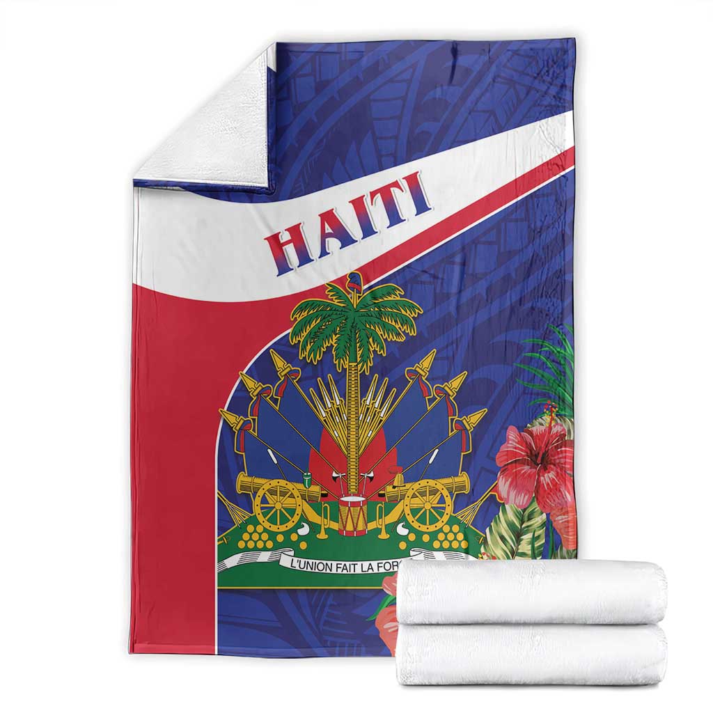 Folded Haiti blanket with blue, red, and white stripes, palm and floral emblem