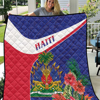 Haiti quilt in blue, white, and red with Haiti lettering and hibiscus-style artwork