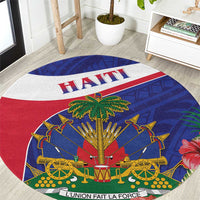 Round blue-red-white Haiti graphic rug with palm tree, cannons, and "L'Union Fait La Force".
