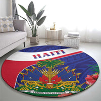 Round carpet showing Haiti lettering and Haitian emblem with palm tree on multicolor background.