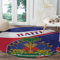 Round rug with Haiti banner, palm tree center, cannons and flags, multicolor design.
