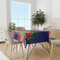 Haiti print tablecloth in blue with red edge and tropical hibiscus flower design