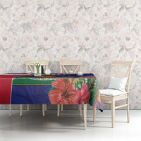 Blue Haiti themed tablecloth with red border and orange hibiscus floral pattern
