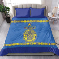 Blue duvet and matching pillows with yellow ornament border and central team crest
