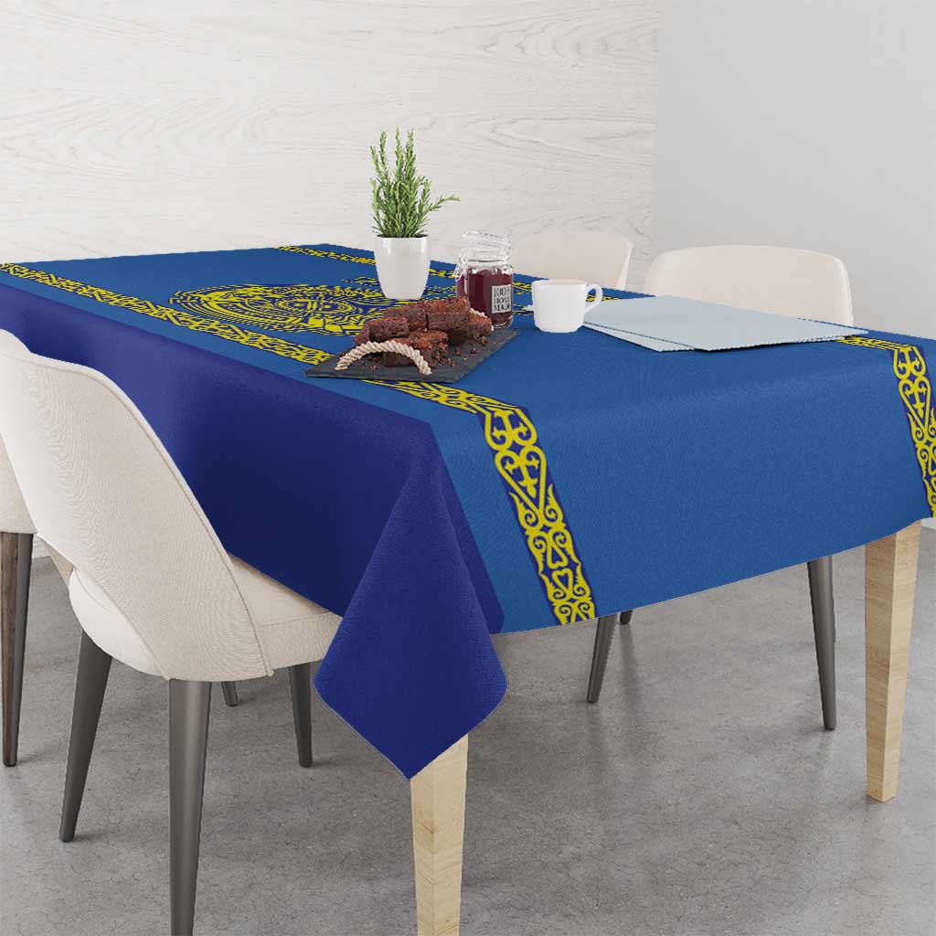 Blue hockey tablecloth with yellow patterned border, corner folds over table edge