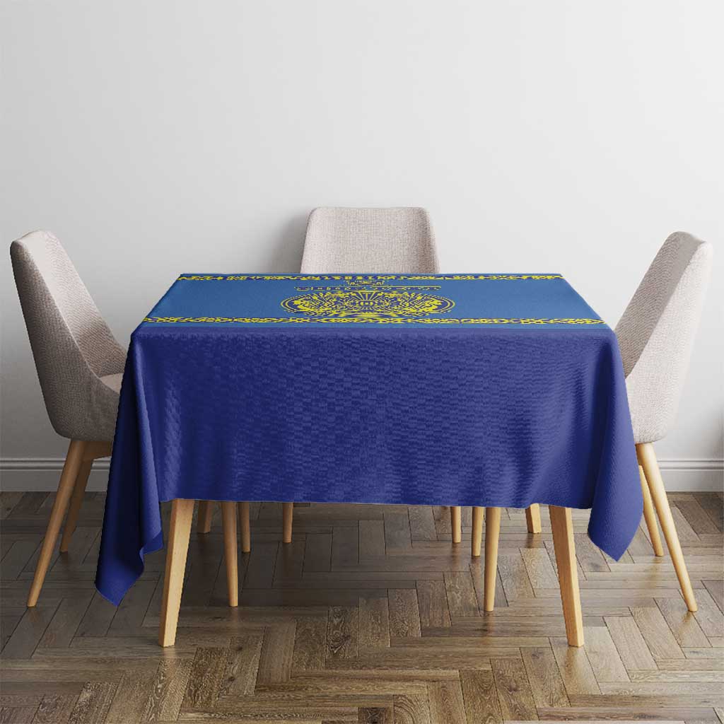 Blue hockey tablecloth with yellow border on small table between four chairs
